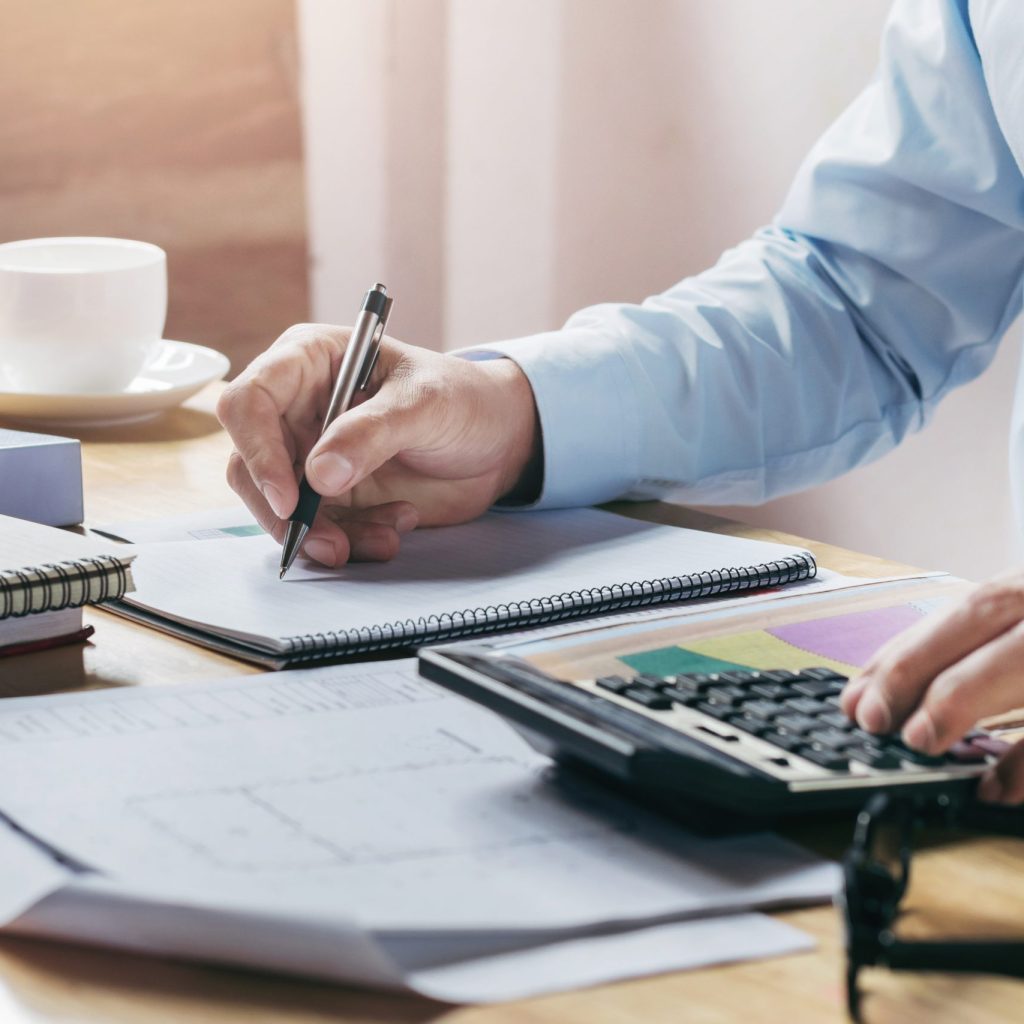 businessman working accountand finance with using calculator and businessman working accountand finance with using calculator and pen on table in office
